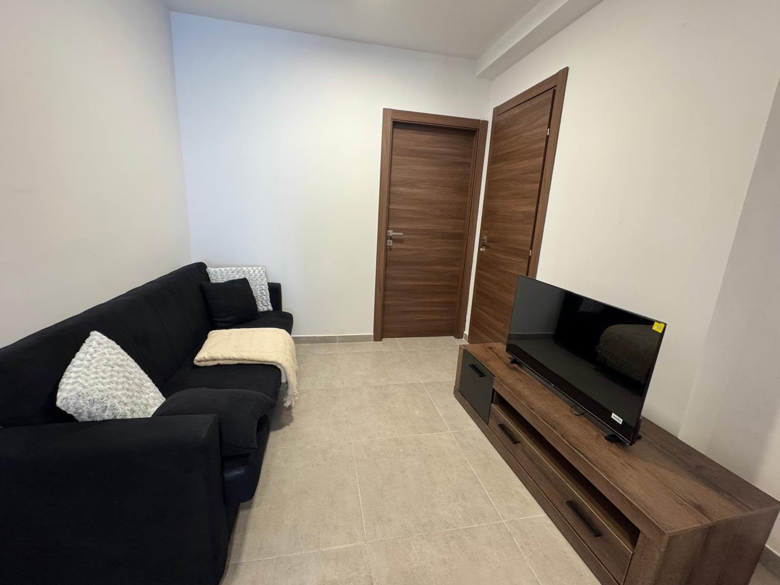 Furnished 1 Bedroom Apartment for Rent | St Paul's Bay: living area — St Paul's Bay